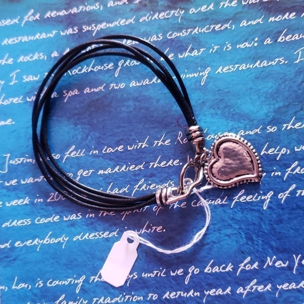 Silver heart bracelets by park lane approximately 8" inches